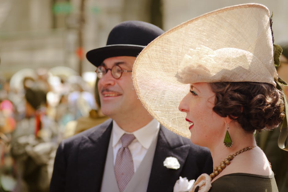 A couple in vintage attire attends the Easter Parade in New York City, exuding classic style and elegance.