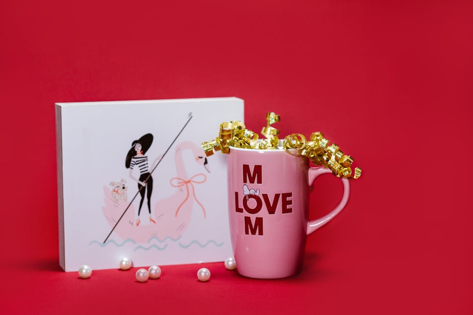 Celebrate Mother's Day with this charming gift set featuring a mug and illustration against a vibrant red background.
