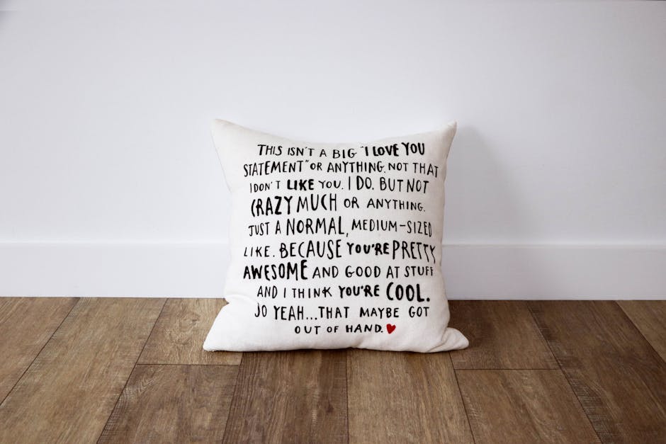 Decorative pillow featuring a playful love message, perfect for modern home decor or Valentine's Day gifts.