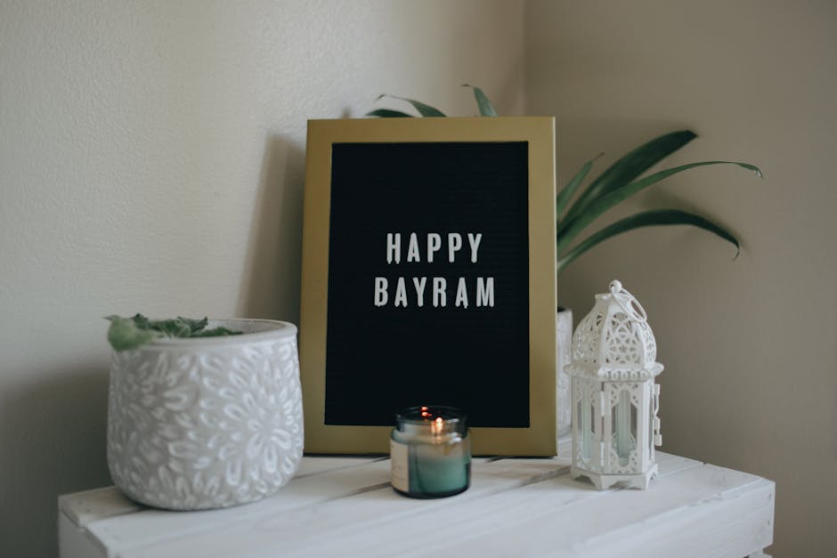 Cozy indoor scene with 'Happy Bayram' sign, candle, and decorative items.