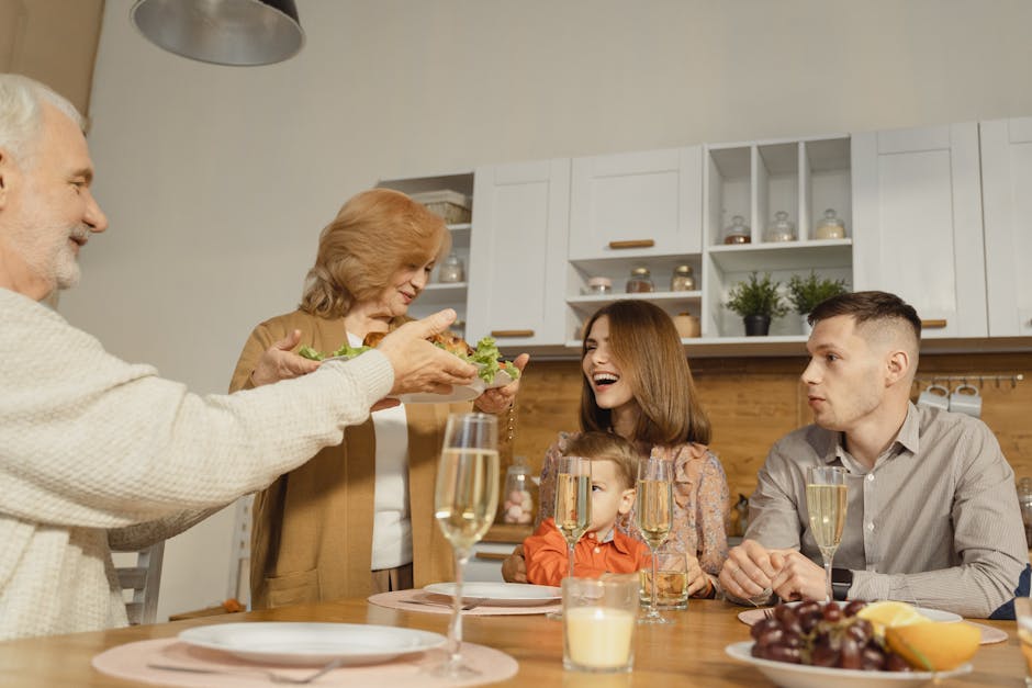 A multigenerational family enjoying a festive dinner indoors, sharing joy and togetherness.
