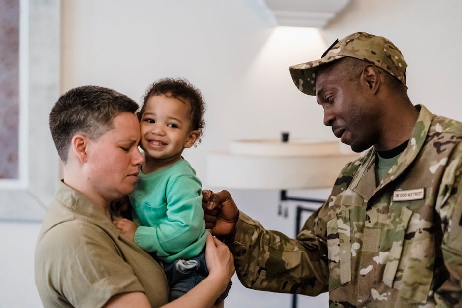A touching moment of a military family reuniting at home, filled with love.