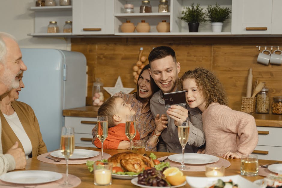A cheerful family enjoying a festive dinner with champagne, laughter, and togetherness indoors.