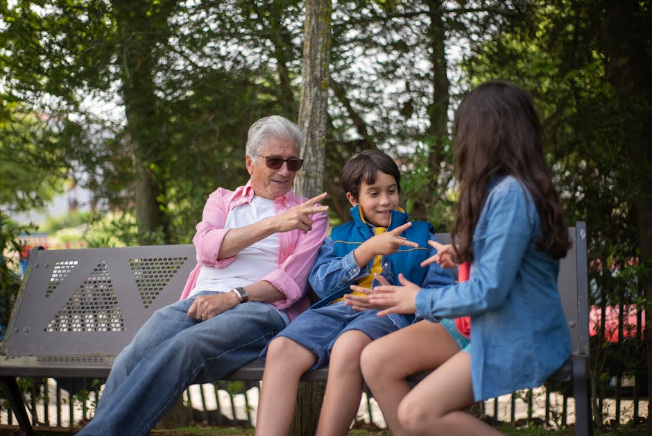 Grandfather and grandchildren bonding at a park bench in Portugal.