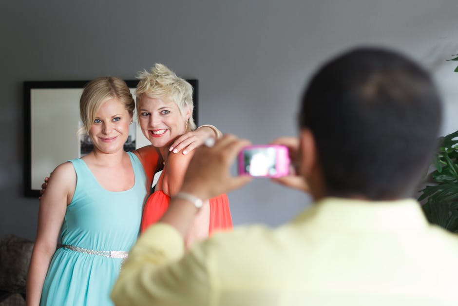 A joyful family captures a happy moment together indoors, showcasing smiles and warmth.