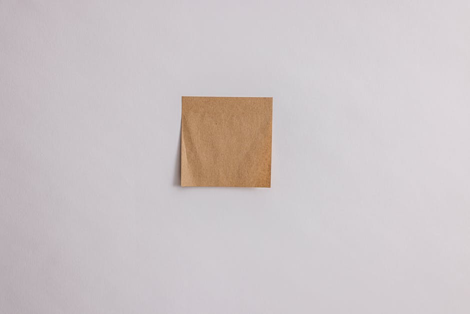 Simple brown paper on a white background offering ample copyspace.
