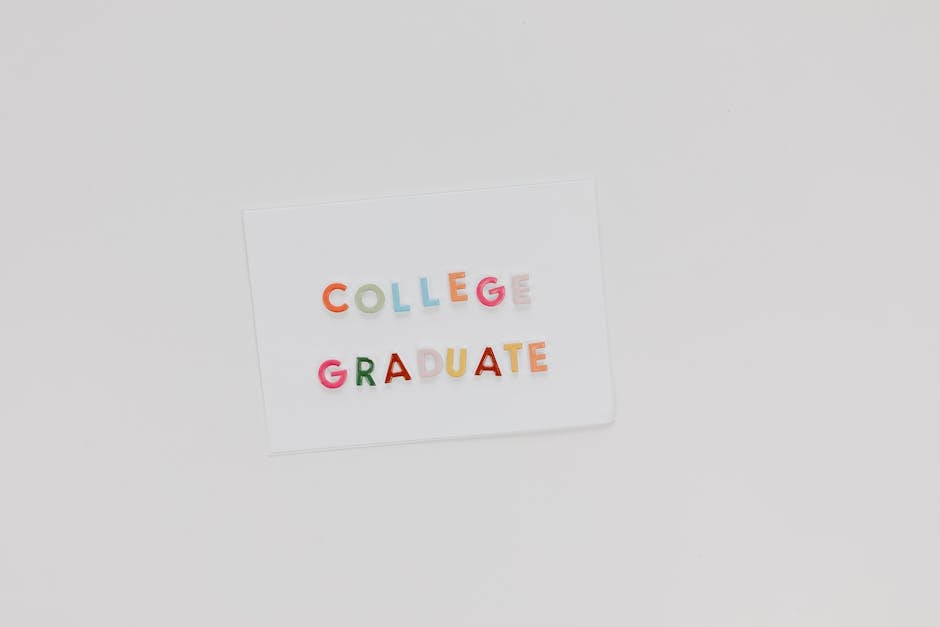 Simple card with colorful letters spelling 'college graduate' on white background.