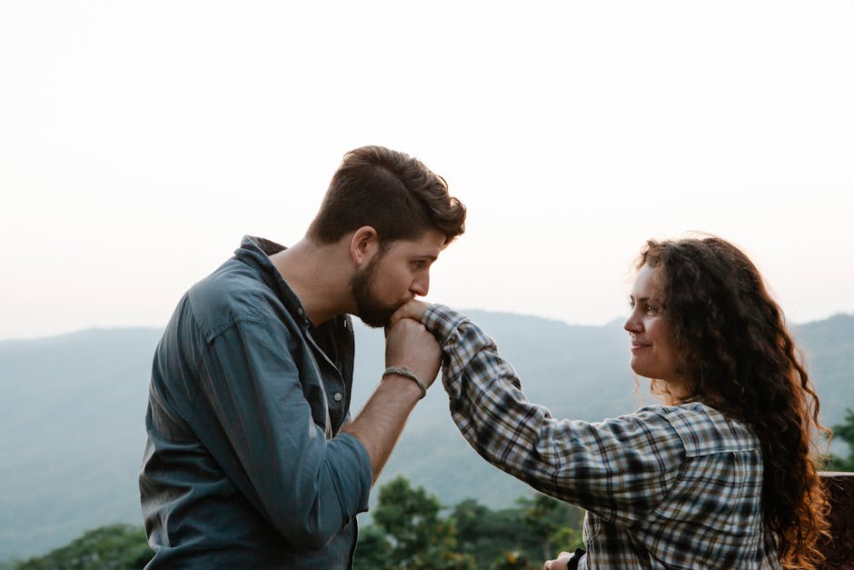 A couple enjoying a romantic moment with a serene landscape in the background, symbolizing love and togetherness.