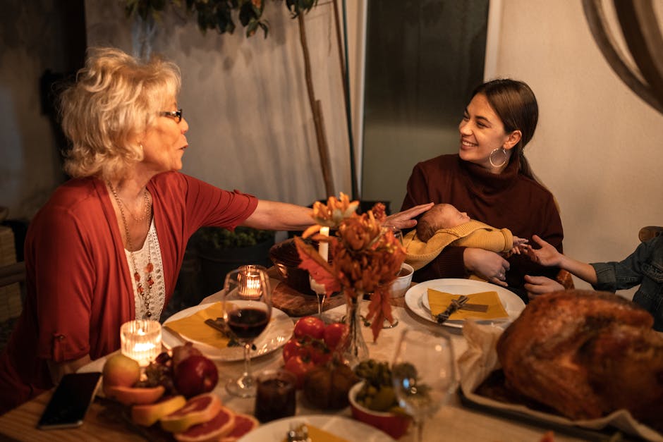 A joyful Thanksgiving dinner with family sharing food and laughter around the table.
