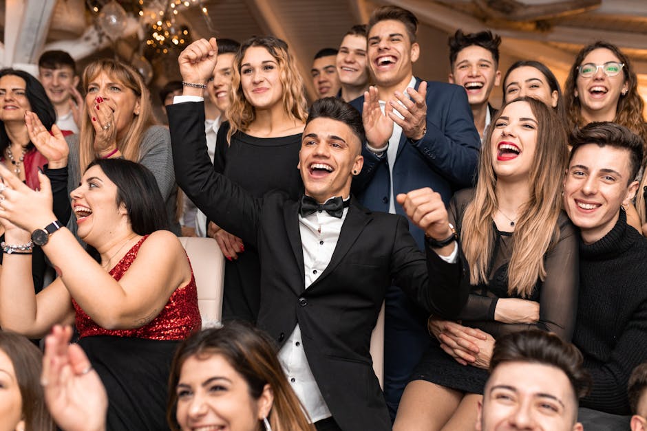 A lively group of friends celebrating at a party with laughter and excitement.