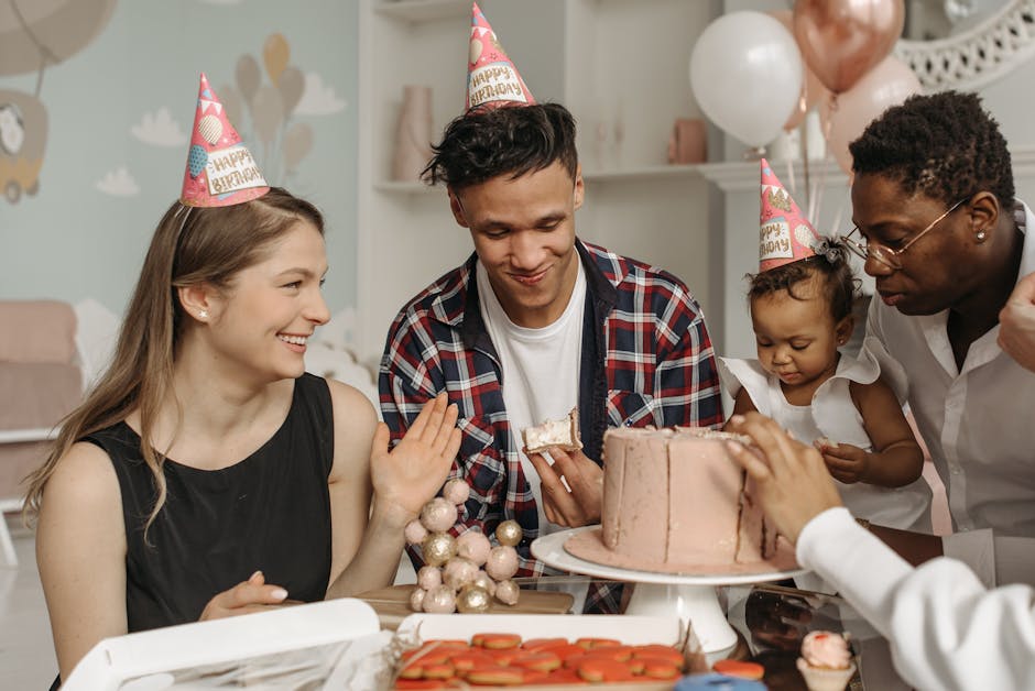 Happy family celebrating a birthday with cake and balloons, creating joyful memories.