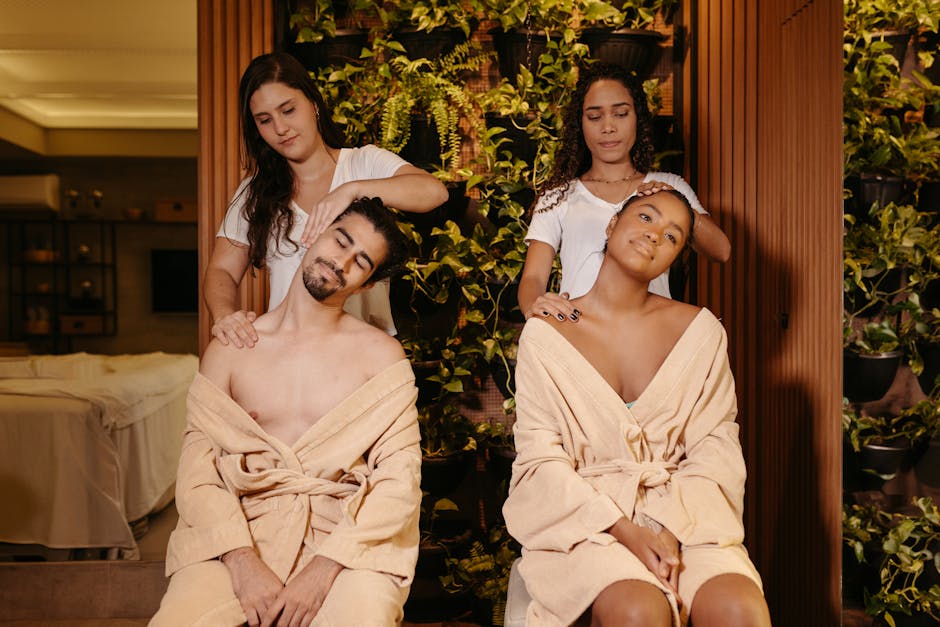 Couple enjoys a rejuvenating massage therapy session in a tranquil spa setting.