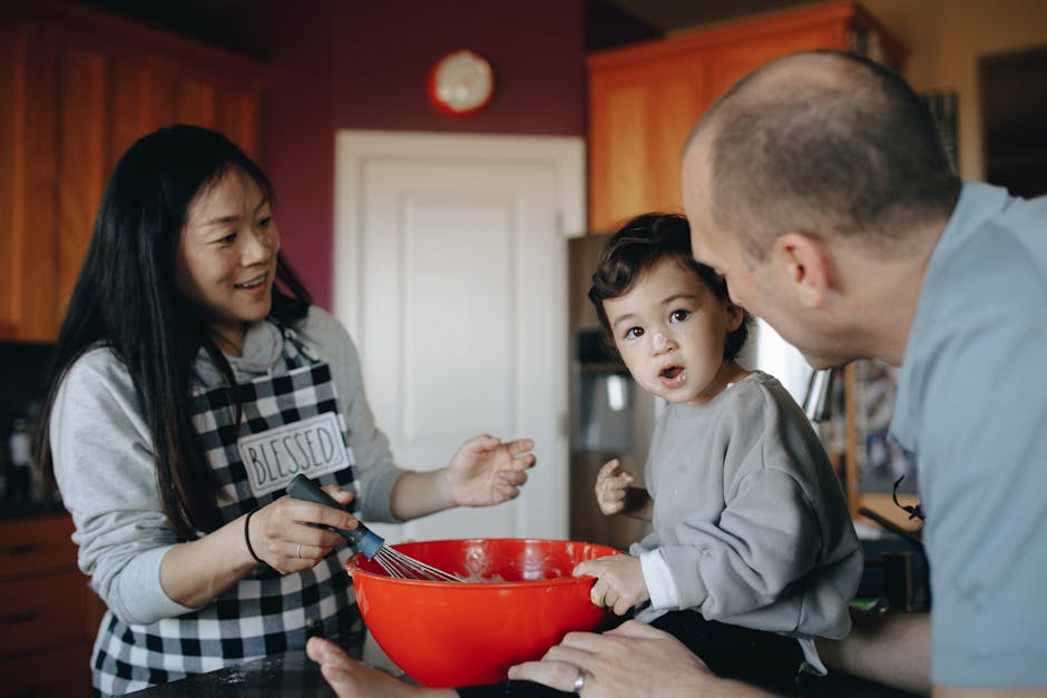A joyful family bonding over baking in the kitchen with smiles and togetherness.