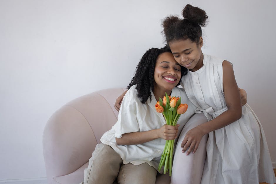A heartwarming scene of a mother and daughter hugging with tulips, capturing love and bonding indoors.