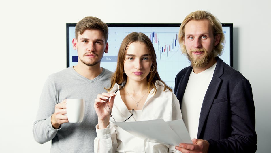 Professional business team discussing financial charts during a meeting in a modern office.