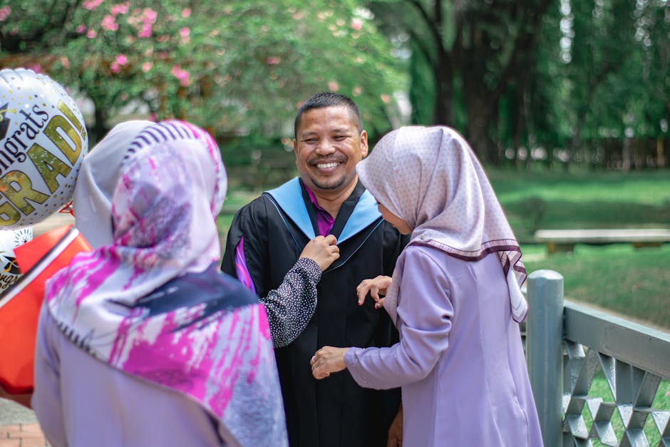 A joyful graduation celebration at a park in Shah Alam, Malaysia with happy family moments.