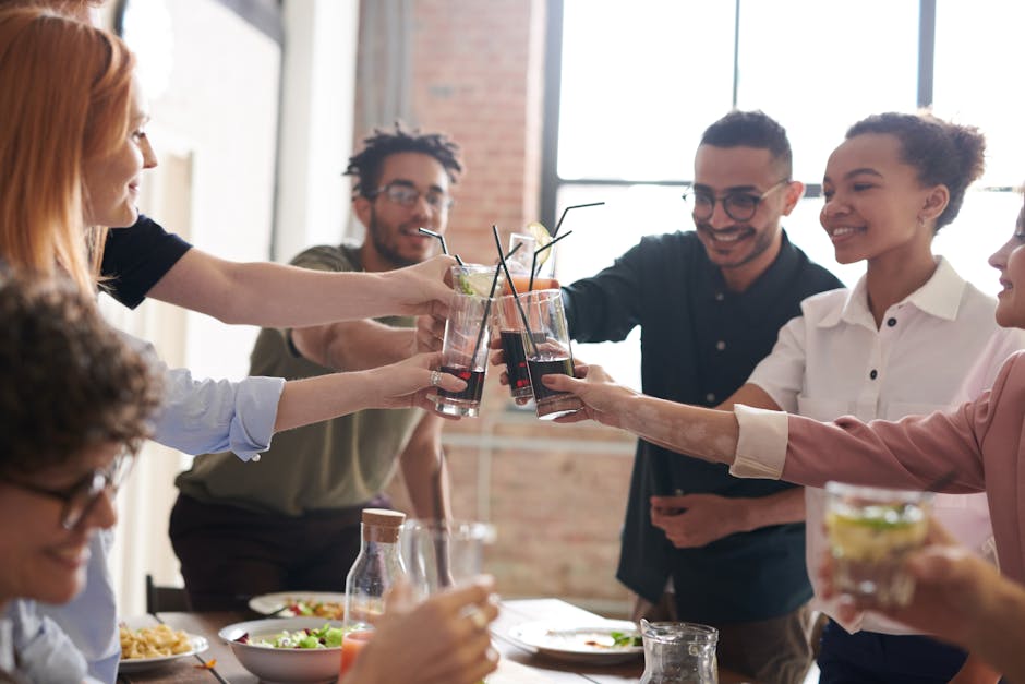 Friends enjoying a cheerful indoor toast, capturing moments of togetherness.