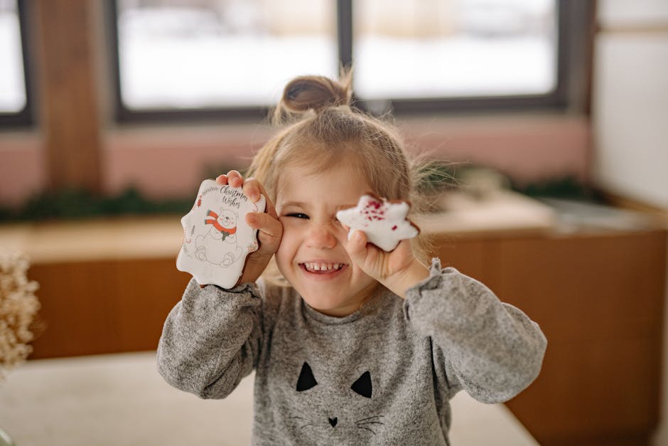 Happy girl with cookies enjoys festive Christmas atmosphere indoors.