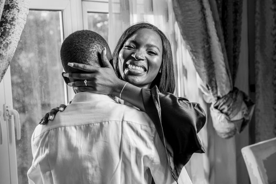 A happy moment captured between a couple in an indoor setting in Jos, Nigeria.