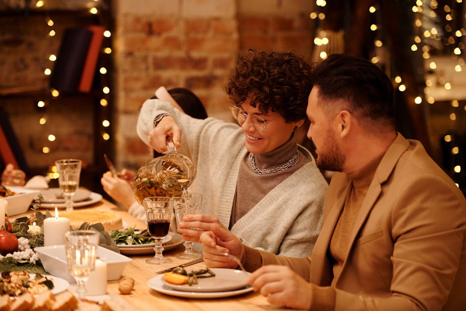 Warm and festive Christmas dinner with friends celebrating indoors with delicious food and drinks.
