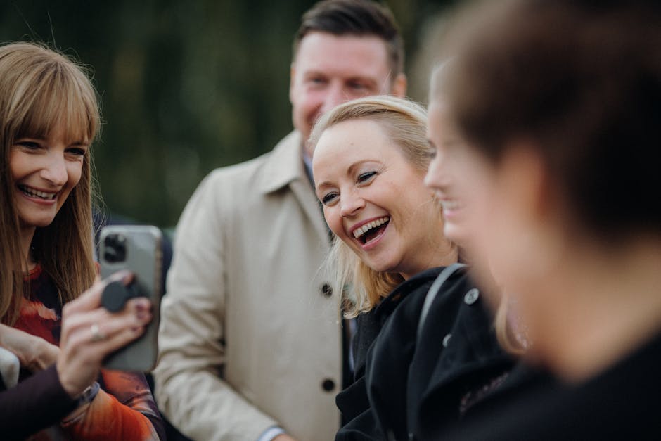 A joyful group of friends sharing a moment captured during an outdoor event.